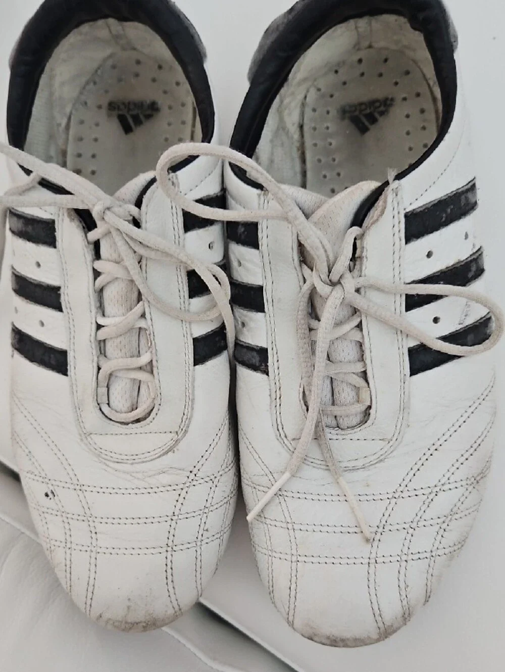 adidas Classic White Athletic Shoes with Black Stripes